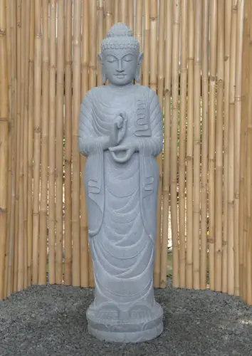Product image of the product “Standing Buddha made of Riverstone in Dharmachakra position - gesture of wheel of the teaching of Dharma. About 151cm height ”